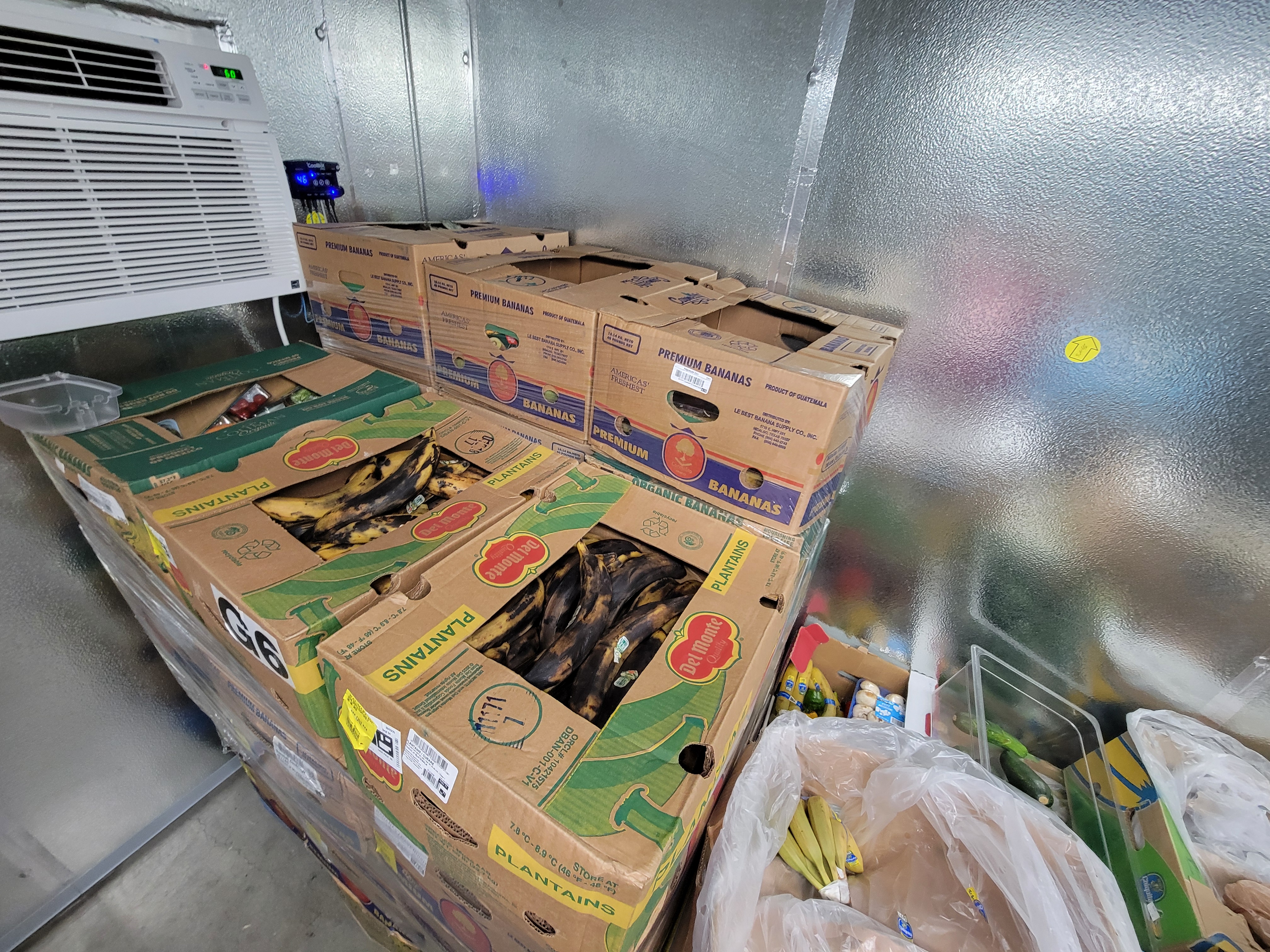 Banana boxes full of plantains.